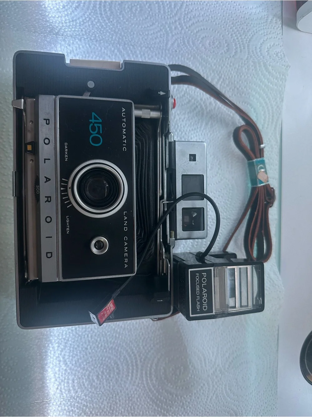 Polaroid 450 Land Camera in Black and Silver with Brown Strap